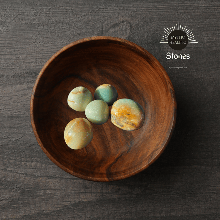 caribbean calcite stones in a handcrafted wooden bowl for meditation.
