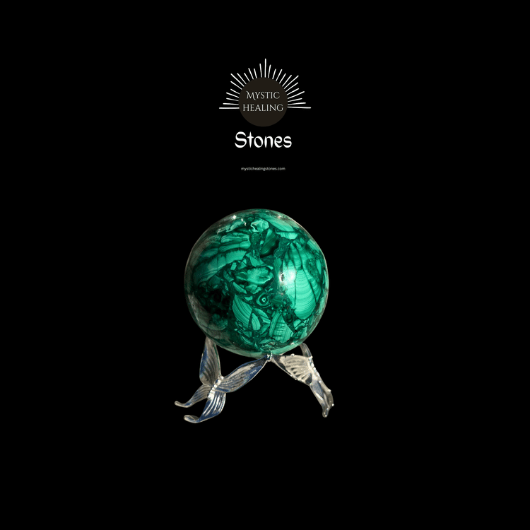 Polished green malachite crystal sphere on a silver stand for mystic healing and meditation.