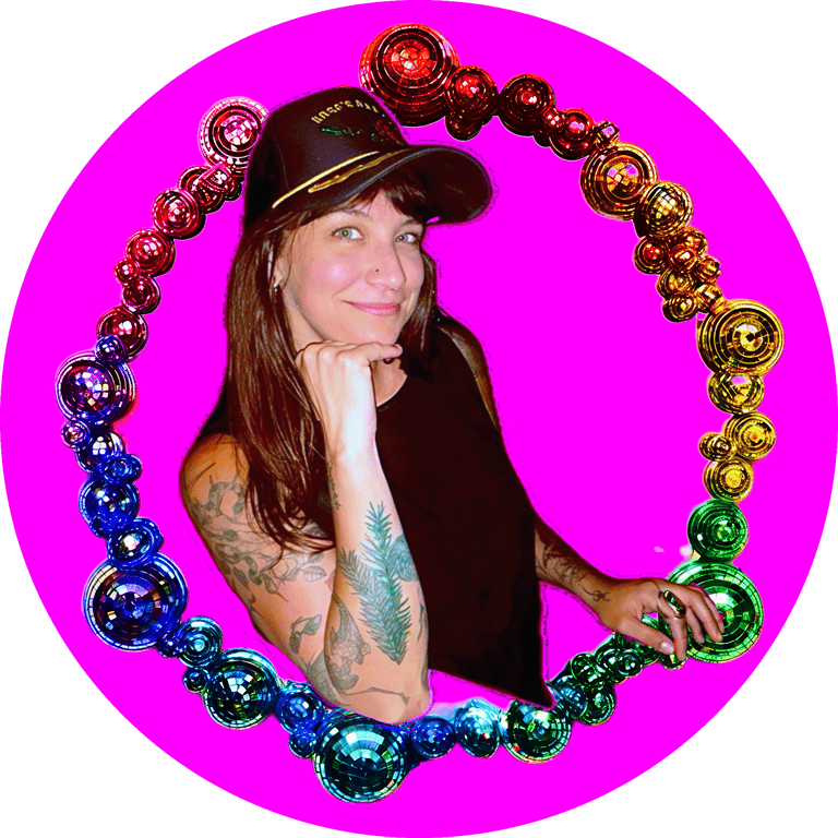 Portrait of Grayson inside a hoop frame of rainbow discoballs