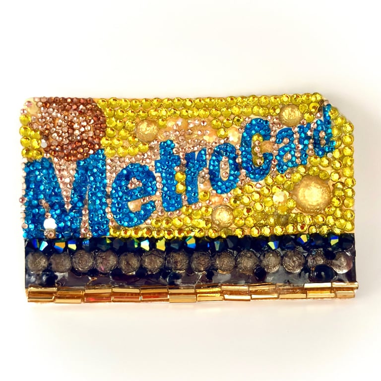 framed work of mterocard covered in crystals