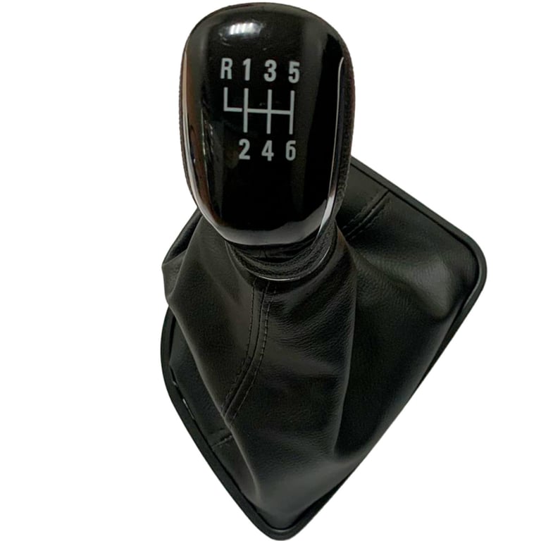 Black leather 6-speed manual car gear shift knob with boot cover isolated on white.