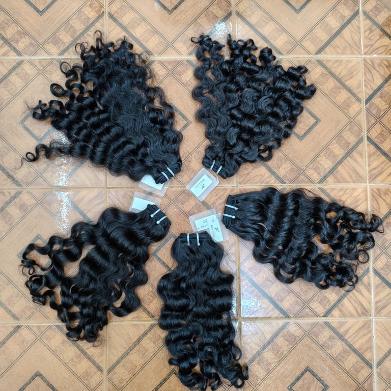 Export quality curly raw human hair bundles from India