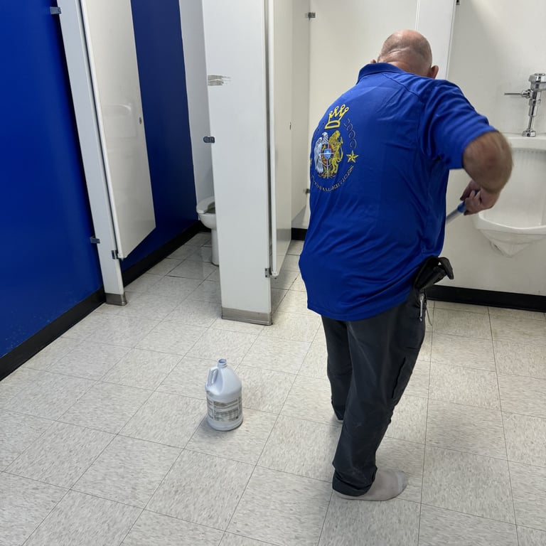 wax coating being applied onto floor after deep cleaning procedure by cleaning technician