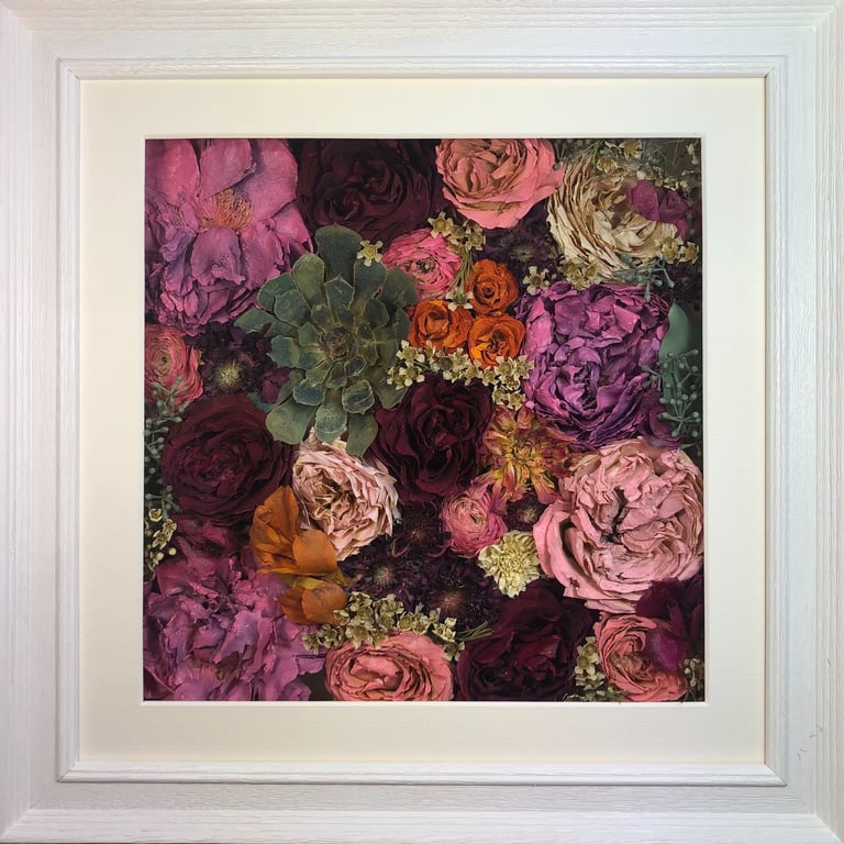 a flower wall style preserved wedding bouquet with stunning succulents in a frame