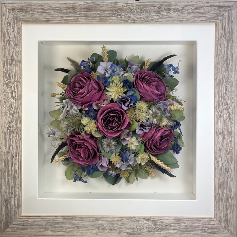 Magenta and lilac Birdseye view preserved wedding bouquet in a frame