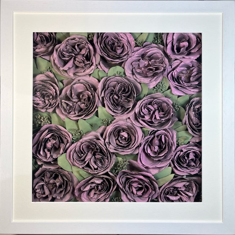 a photo of a flower wall style preserved wedding bouquet in a frame