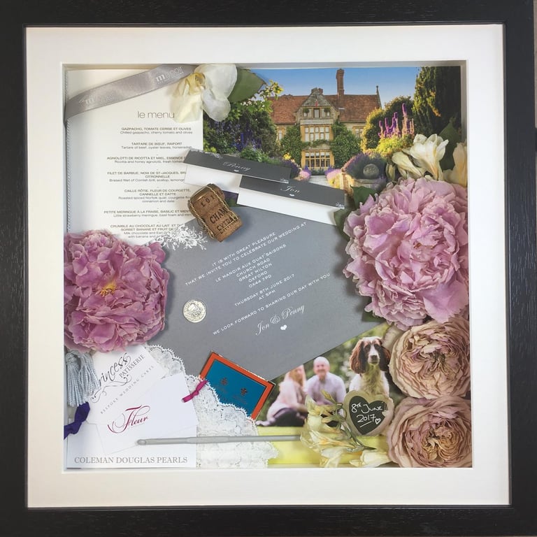 memory box full of preserved wedding flowers, photos of loved ones and pets, and other wedding bits