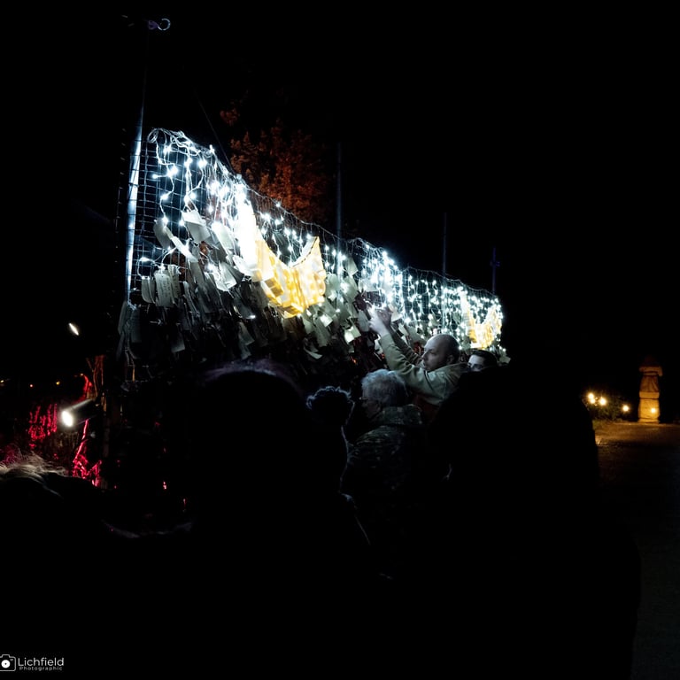 Luminate people standing in front of a make a wish station