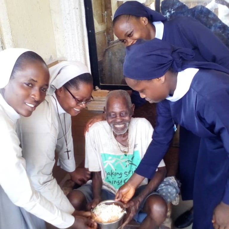 Catholic sisters providing care and companionship to an elderly man