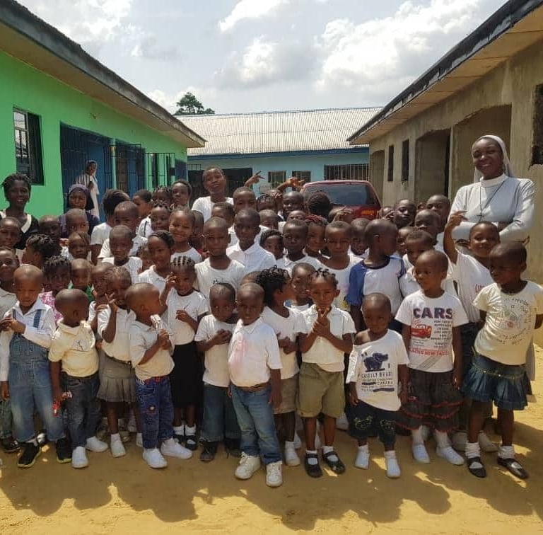 Children gathered together during Catholic community outreach program
