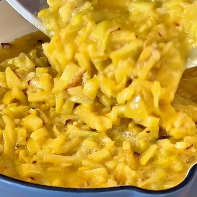 Pour in the potato and egg mixture