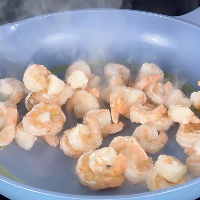 Sauté the shrimps for 2–3 minutes until just cooked