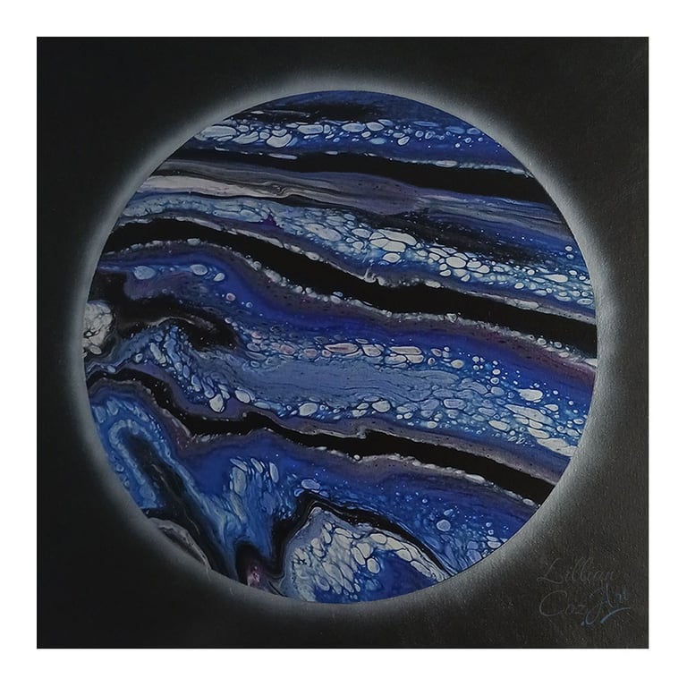 Black background with glowing orb in blues, grays, silver, and black