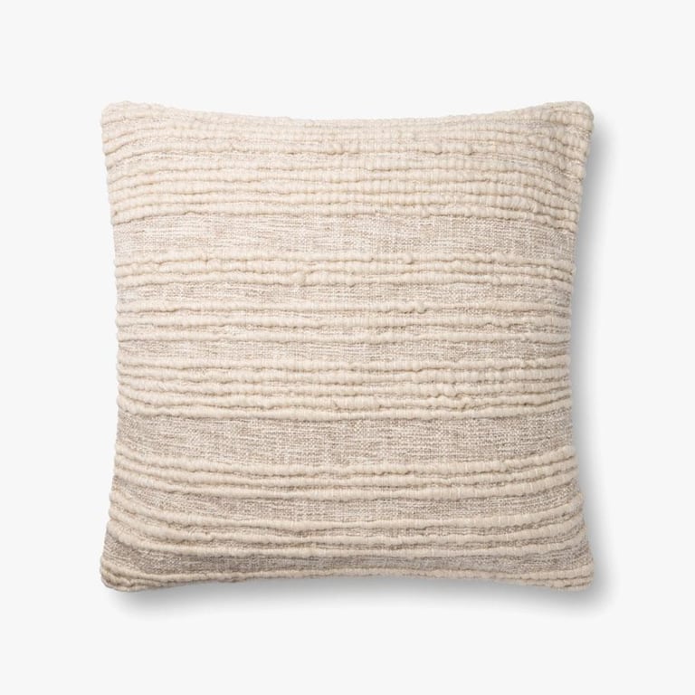 a pillow with a white and beige striped pillow