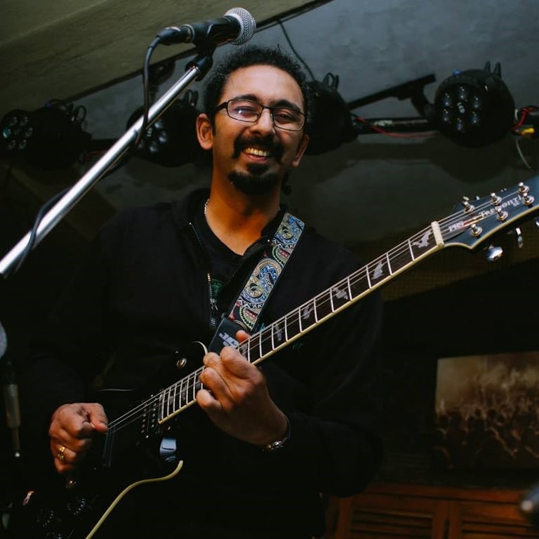 Amar Kulkarni, a singer-songwriter performs at an Orange Octopus event in 2018