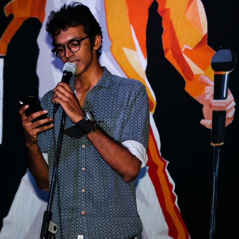 KC Vlaine, a singer-songwriter performs at an Orange Octopus event in 2018