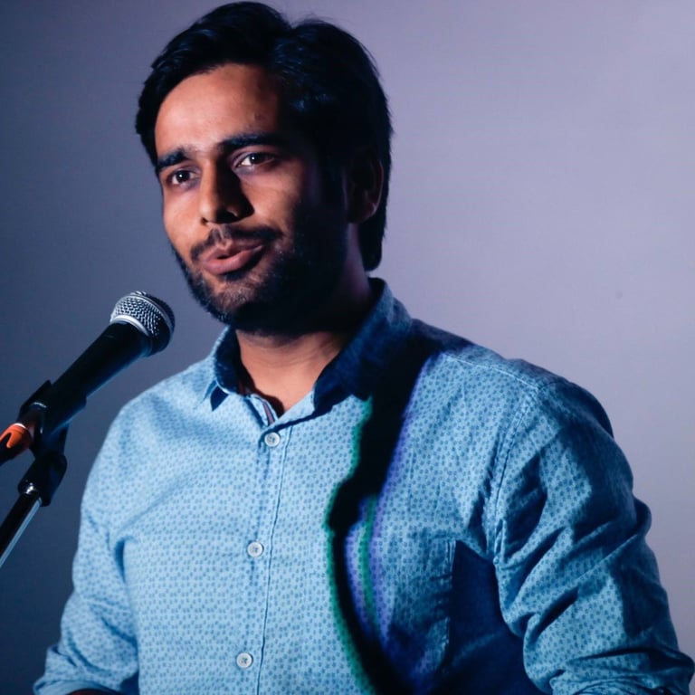 Parth Walunjkar, a singer-songwriter performs at an Orange Octopus event in 2018