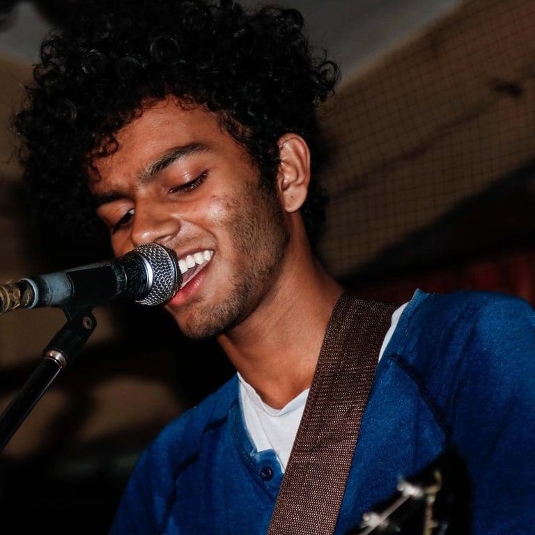 Himanshu Chavan, a singer-songwriter performs at an Orange Octopus event in 2018
