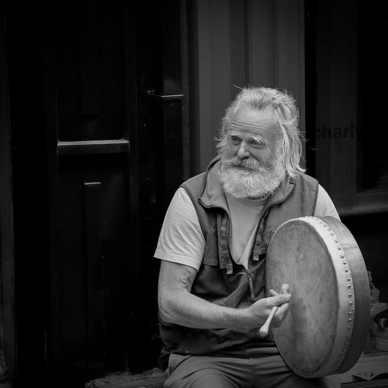 "Bodhran Player, Fleadh 2024" by Darren Arkins