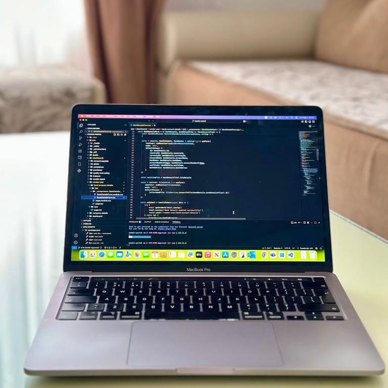 My MacBook Pro M2 with VSCode running NextJS dark theme on a couch in a sunny living room