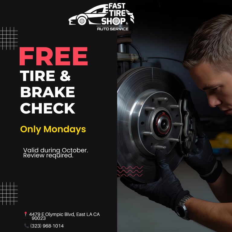 Mechanic checking car brakes during free tire and brake inspection Monday promotion at Fast Tire Sho