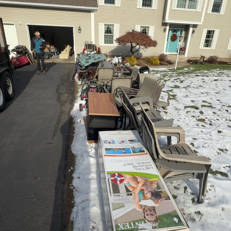 Attic cleanout in Belchertown removing stored belongings