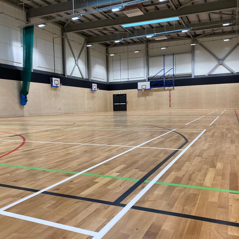 Whitley Bay HighSchool Refurbished Sports hall 600m2 Sanding Sealing and Lined