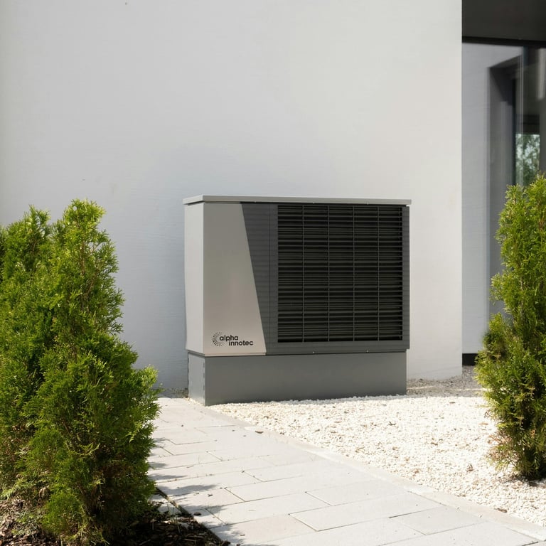 a small air conditioner sitting in front of a house