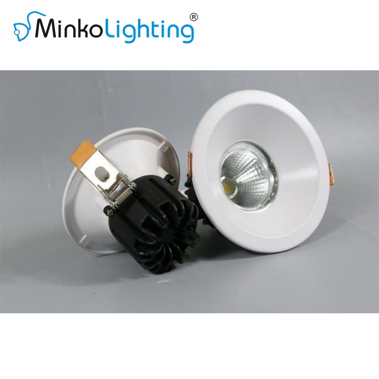 MNK-S5C a white light bulb on a white surface with a white light bulb