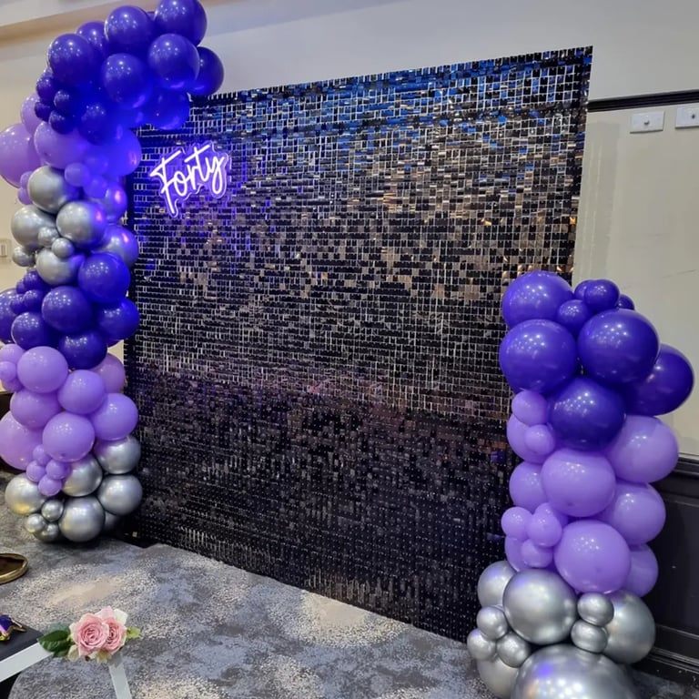 Black shimmer wall and 3m balloon garland for the pimped photo booth in Logan.