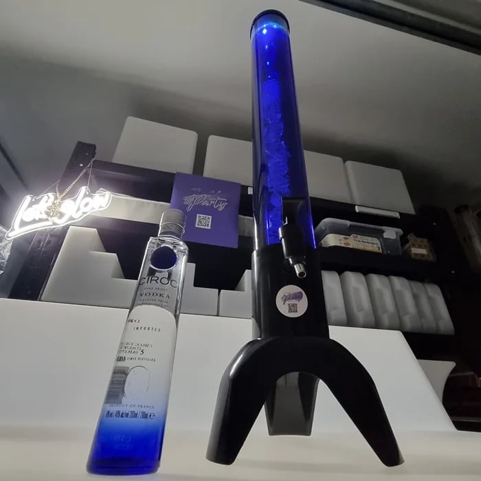 Blue glowing drink tower with Ciroc Vodka bottle beside, available to hire in Redlands.
