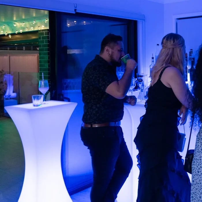 Guests at Carly and Kahn's vow renewal being served at the glow bar in Redlands.