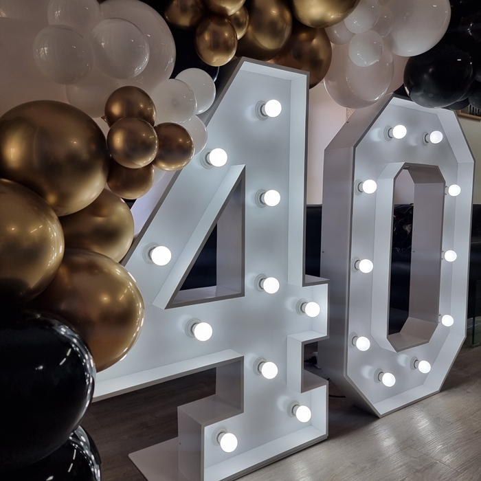White light-up 40th birthday numbers setup in Redlands by SweetAz.
