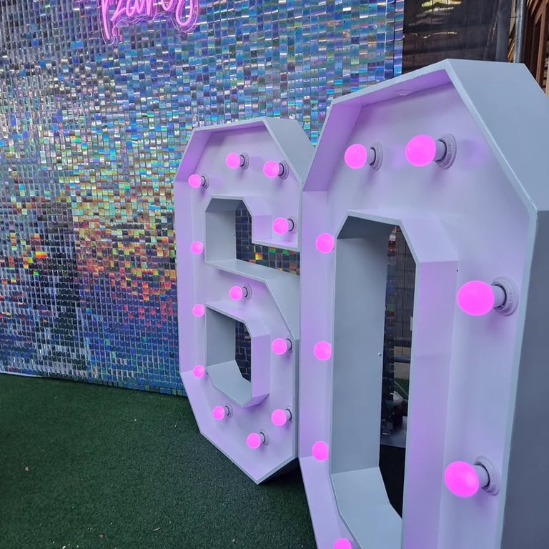 Lightup Number lit and ready for an epic 60th Birthday in Currumbin, Gold Coast - party hire by SweetAz Co.