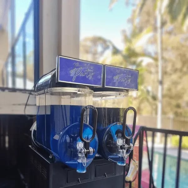 Slushie Machine with Blue Raspberry in Wakerley, Brisbane - party hire by SweetAz Co.