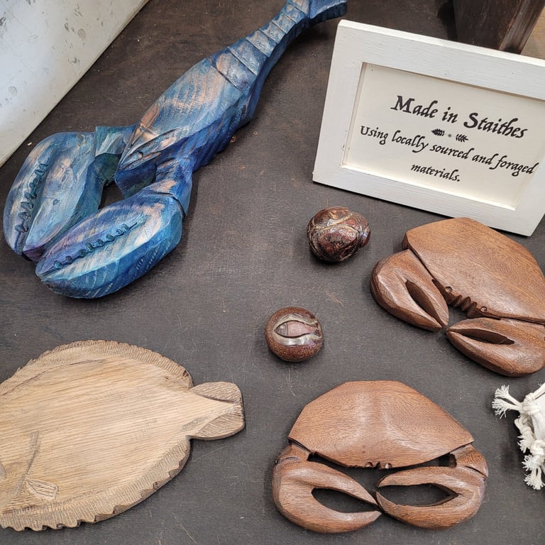 Carved lobster and crabs by Jack Iredale