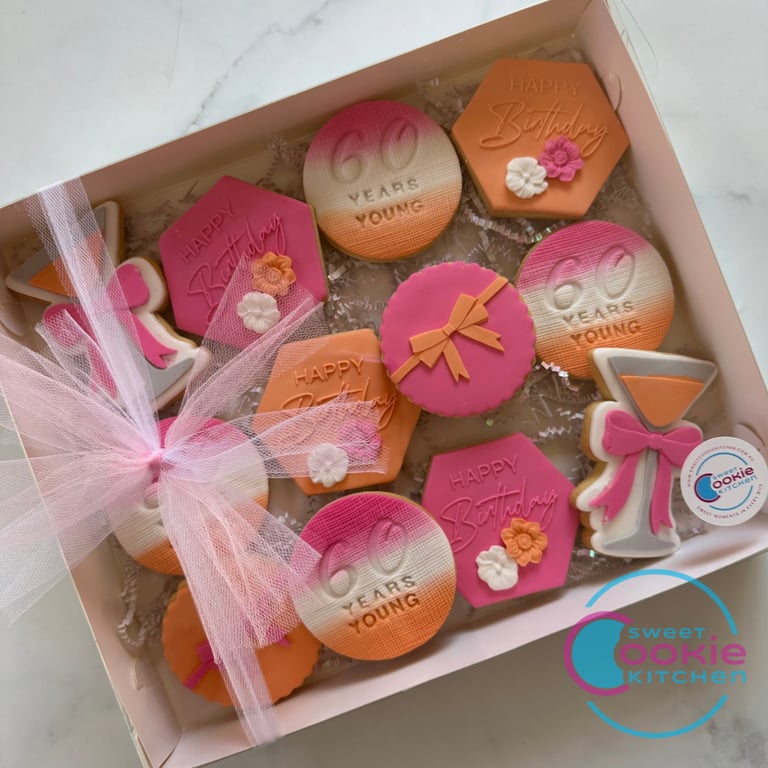 12 cookie gift box for 60th birthday, pink orange white theme.