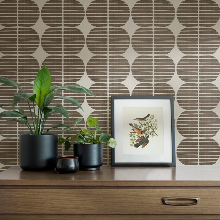 Chocolate Brown Mid-century Organic geometric wallpaper above a midcentury sideboard — The Wallpaper Edit 