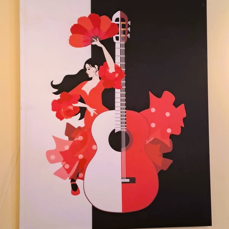 Decoración con cuadro de flamenco y guitarra en la pared de la galería del Bar Las Tinajas Huelva.