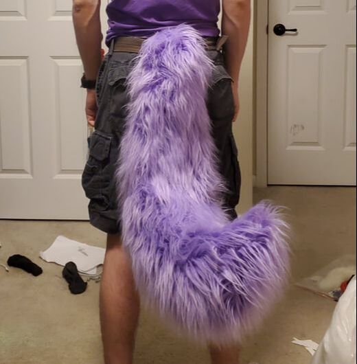 A fluffy purple tail made by Teto Creations