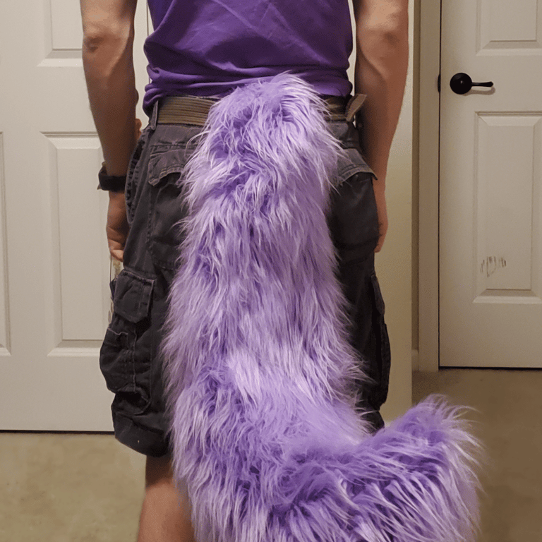 A fluffy purple tail made by Teto Creations