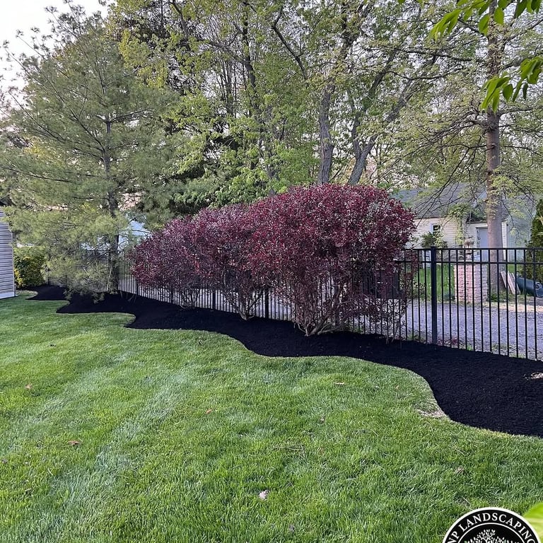 excellent landscaping and hardscaping of grass, stones and trees by NP Landscaping