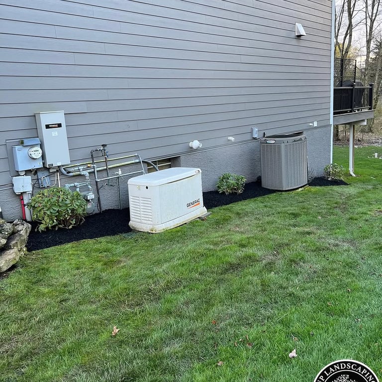 excellent landscaping and hardscaping of grass, stones and trees by NP Landscaping