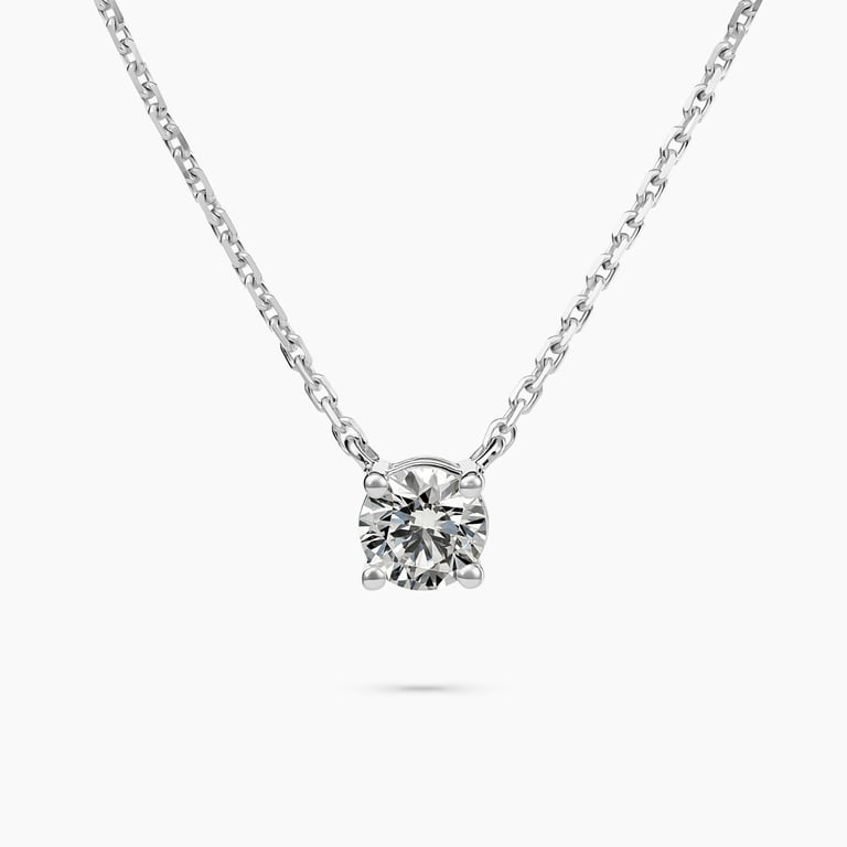 Stunning silver necklace with a brilliant round diamond pendant, showcased on a pristine white background for e-commerce