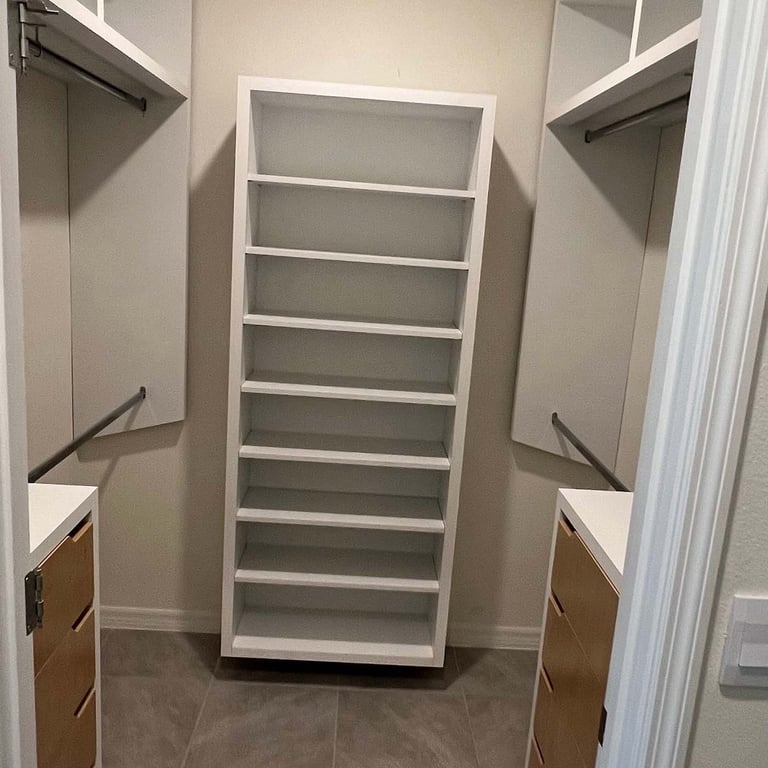 Picture of walk-in closet created by White and Wood Custom Carpentry in Orlando Florida