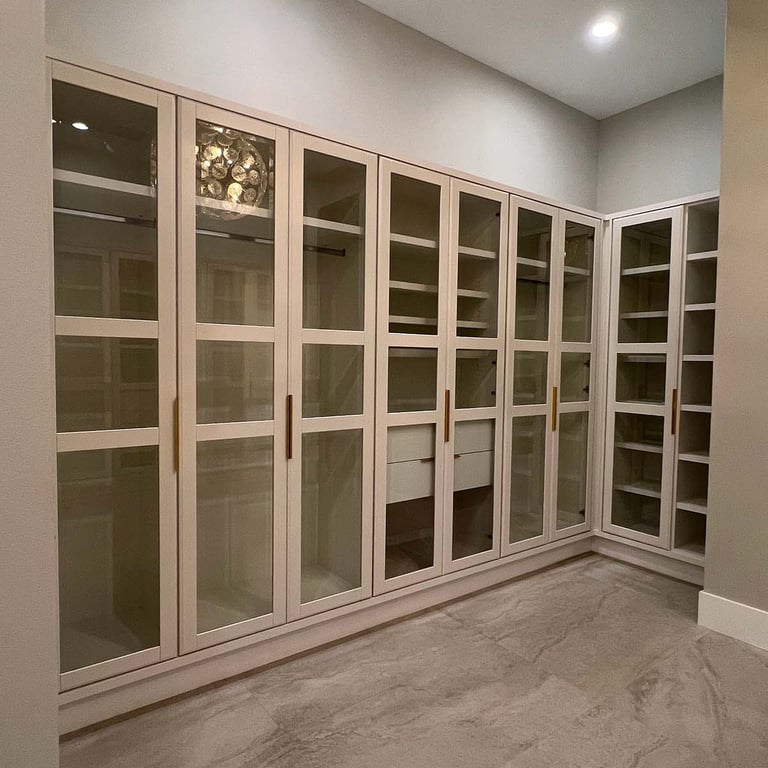 Picture of walk-in closet created by White and Wood Custom Carpentry in Orlando Florida