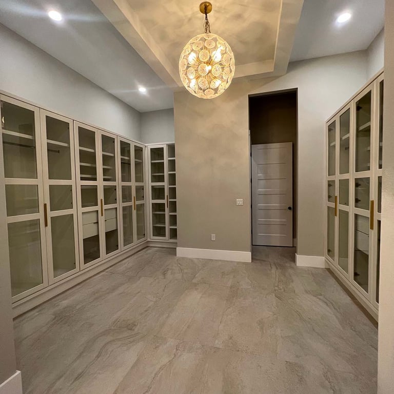 Picture of walk-in closet created by White and Wood Custom Carpentry in Orlando Florida