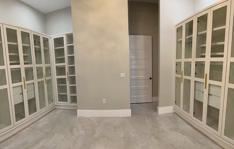 Picture of walk-in closet created by White and Wood Custom Carpentry in Orlando Florida