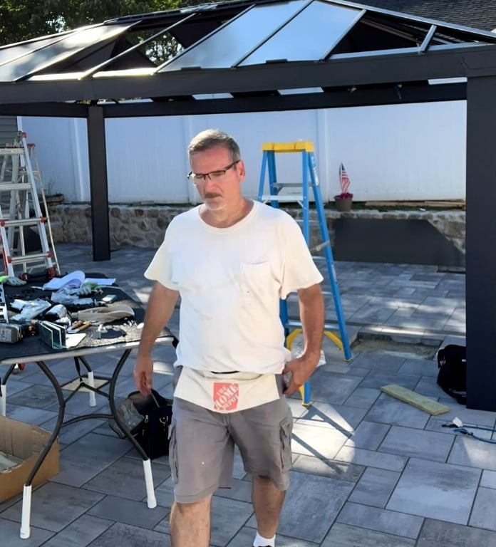Assembly in progress for a metal Canopia gazebo