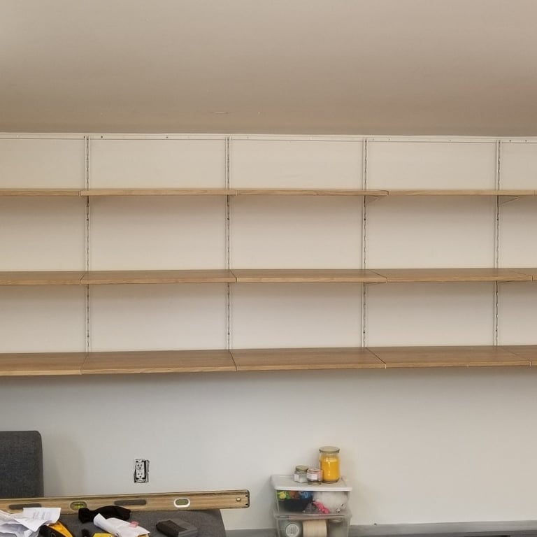 7 sections of IKEA shelving installed